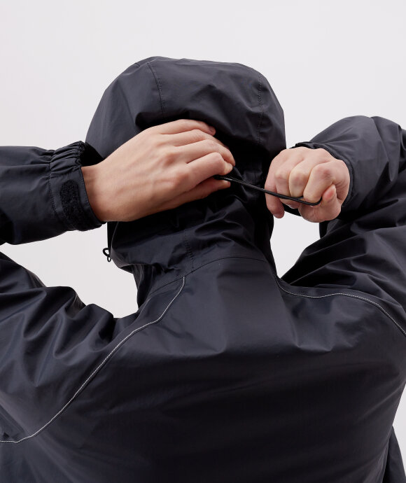 And Wander - Loose Fitting Rain Jacket